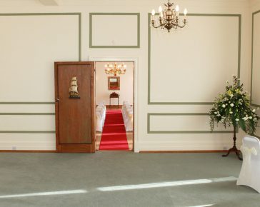 Room with red carpet for a wedding