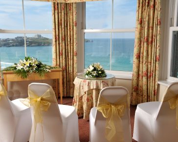 Wedding chair set up with view overlooking the sea.