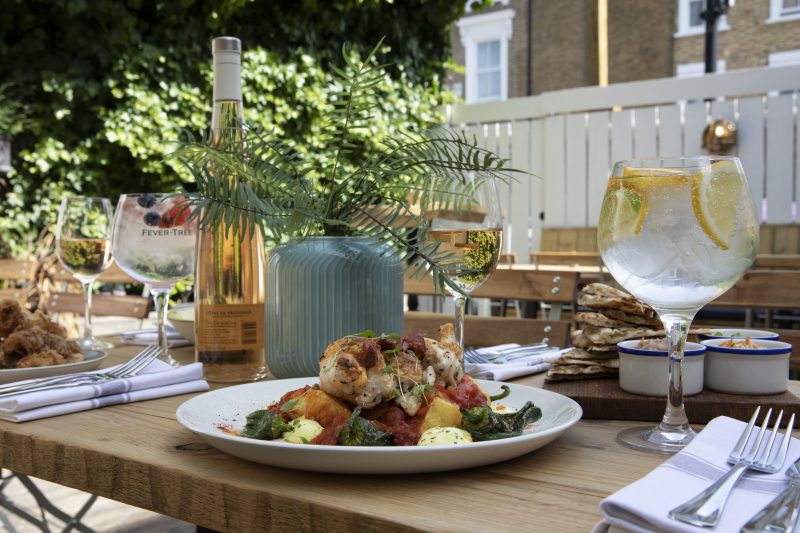 Table in the Latchmere Garden with food and drinks